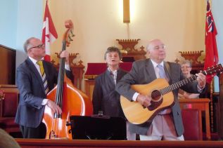 l-r Brian, Mary and Wayne Abrams perform at the 130th Anniversary celebrations at the Snow Road Presbyterian church where Rev. Karen Hincke led the service